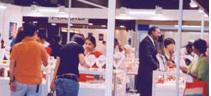 Visitors Admiring Products on Display