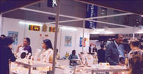 Visitors Admiring Products on Display