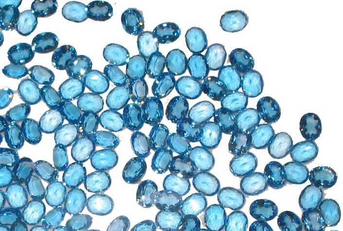 Numerous Oval Cut Blue Topaz Gemstones