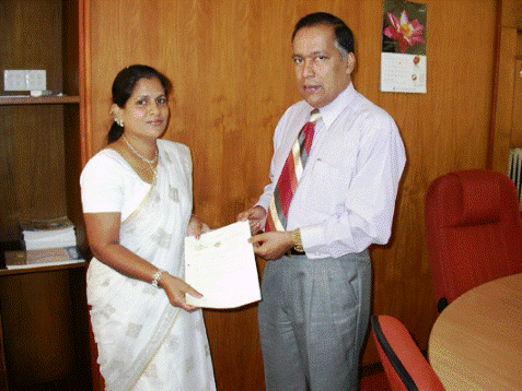 NGJA Chairman Presenting the 50th Stock of Silver to Mrs Rupika Perera
