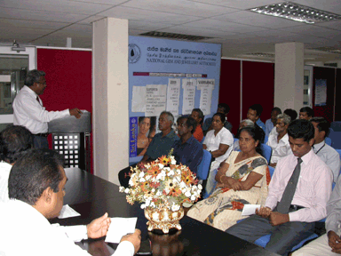 Acting Director General, Mr Ajith Perera explaining details of the program of distributing silver