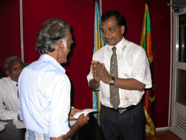 Mr Mahindalal Gunatilake Director General NGJA personally donating silver to some of the recepients