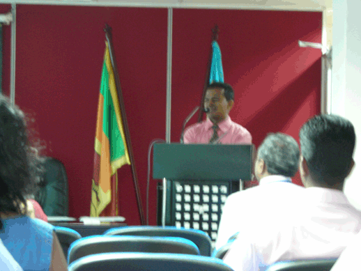 Mr P R K Fernando delivering the lecture value addition Sri Lankan gemstones through irradiation