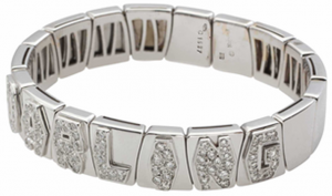 Lot 08 - Diamond and White Gold Bangle Bracelet - by Marina B.