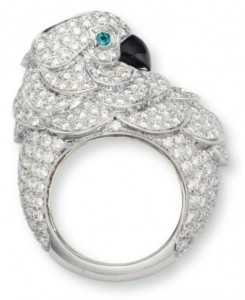 Lot 46 - Diamond, emerald and onyx parrot ring by Cartier