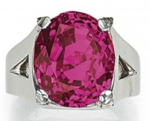 Lot 337 - 23.66-carat, oval-shaped, Queen of Burma ruby ring
