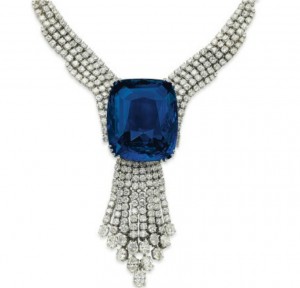 Blue Belle of Asia with diamond tassel pendant suspended from it, in a diamond necklace