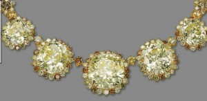 Lot 267 - Five yellow, cushion-shaped diamonds of the impressive colored diamond necklace 