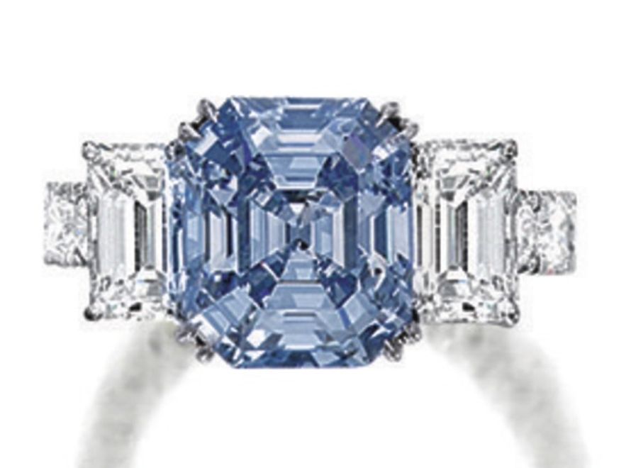 Lot 1784 - Very Fine Fancy Intense Blue Diamond and Diamond Ring