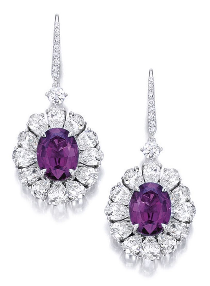 Lot 1758 - Pair of Alexandrite and Diamond Pendent Earrings as seen in incandescent light