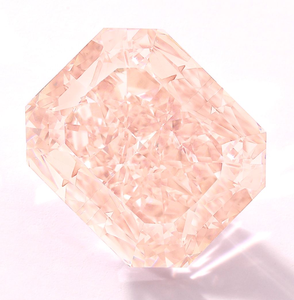 Lot 1696 - Important Fancy Orangy Pink Diamond and Diamond Ring