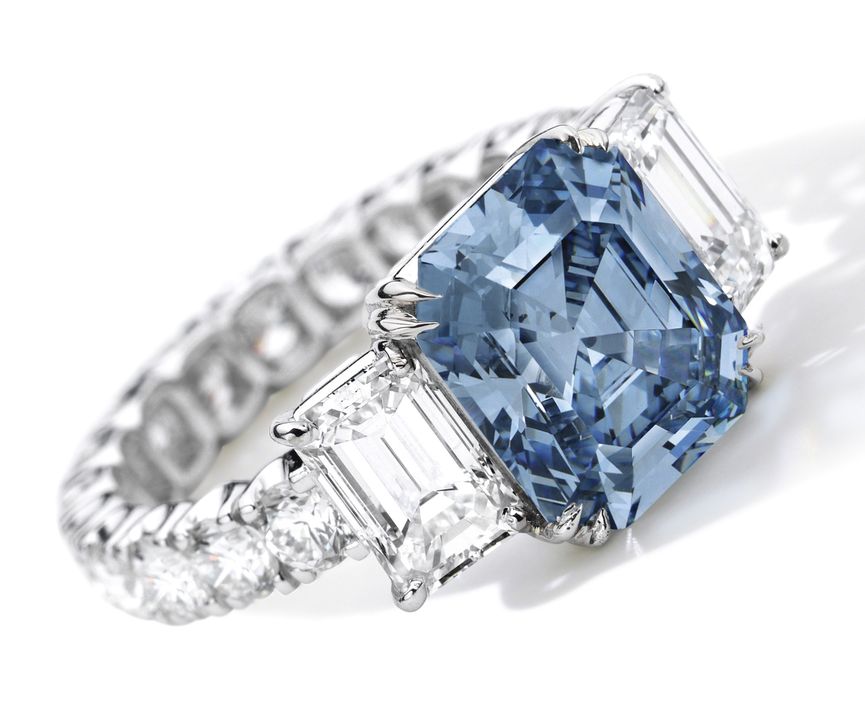 Lot 1784- Very Fine Fancy Intense Blue Diamond and Diamond Ring.