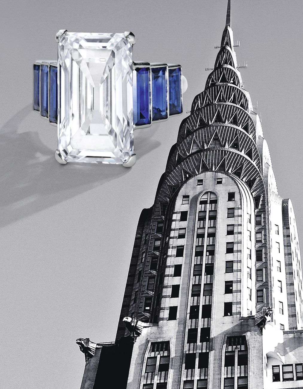 Lot 251 -Art Deco Platinum, Diamond and Sapphire Ring, France, with the ART Deco New York Chrysler Building in the background, both depicting geometric features characteristic of this period