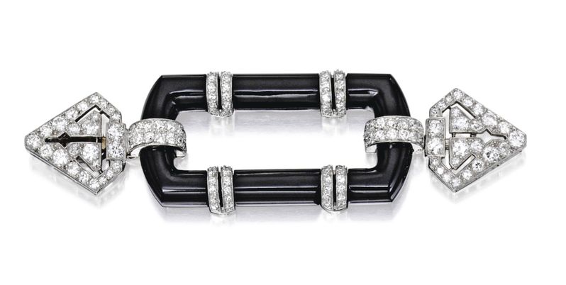 Lot 64 - Platinum Onyx and Diamond Cliquet, Cartier