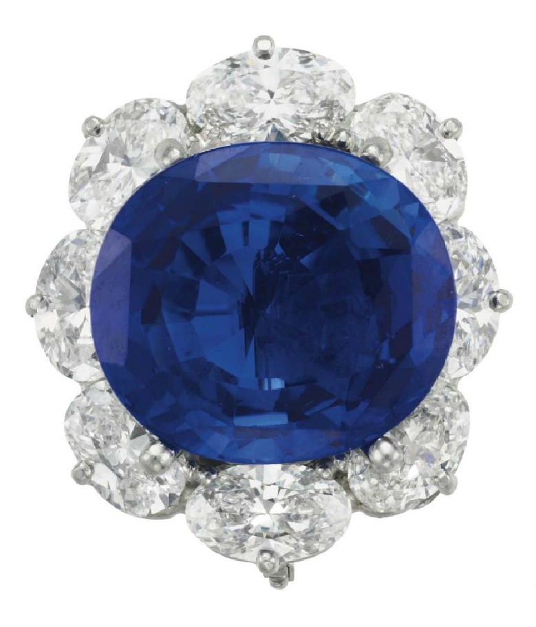 LOT 248 - A SAPPHIRE AND DIAMOND RING, BY VAN CLEEF & ARPELS