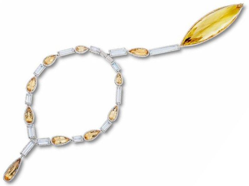 FASHION FORWARD - 18K WHITE AND YELLOW GOLD SOLAR FLARE BACK DROP NECKLACE 