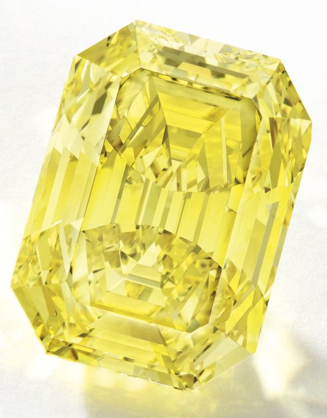 LOT - 1698 - IMPORTANT FANCY VIVID YELLOW DIAMOND RING