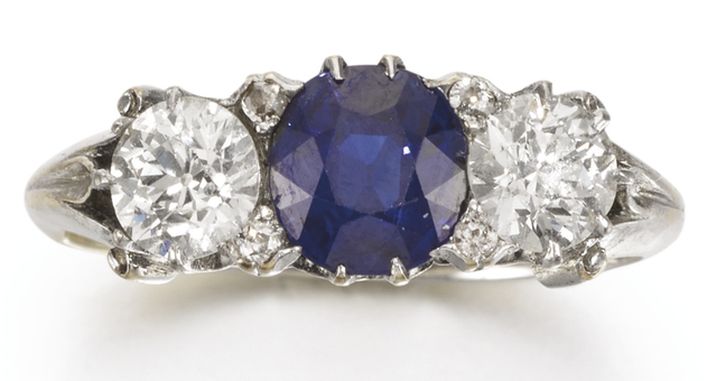 LOT 311 - SAPPHIRE AND DIAMOND WEST & SON RING