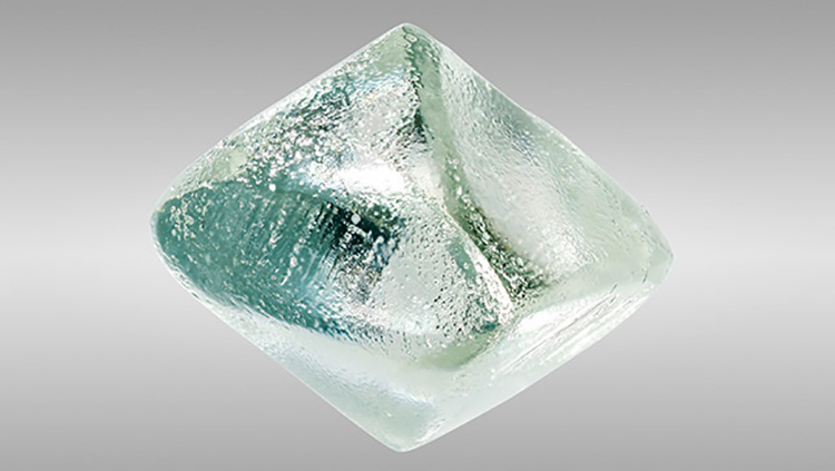 VERY LIGHT GREEN, 9.71-CARAT, SYNTHETIC MOISSANITE CRYSTAL, SUBMITTED TO GIA CARLSBAD LABORATORY