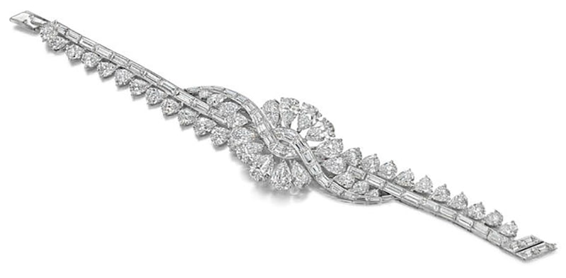 LOT 128 - ANOTHER VIEW OF THE DIAMOND 'VOLUTES' BRACELET, by Van Cleef & Arpels, circa 1954