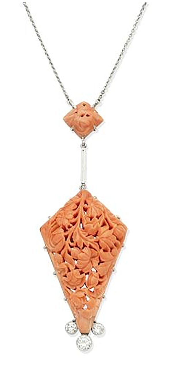 LOT 315 - A CORAL AND DIAMOND PENDANT NECKLACE