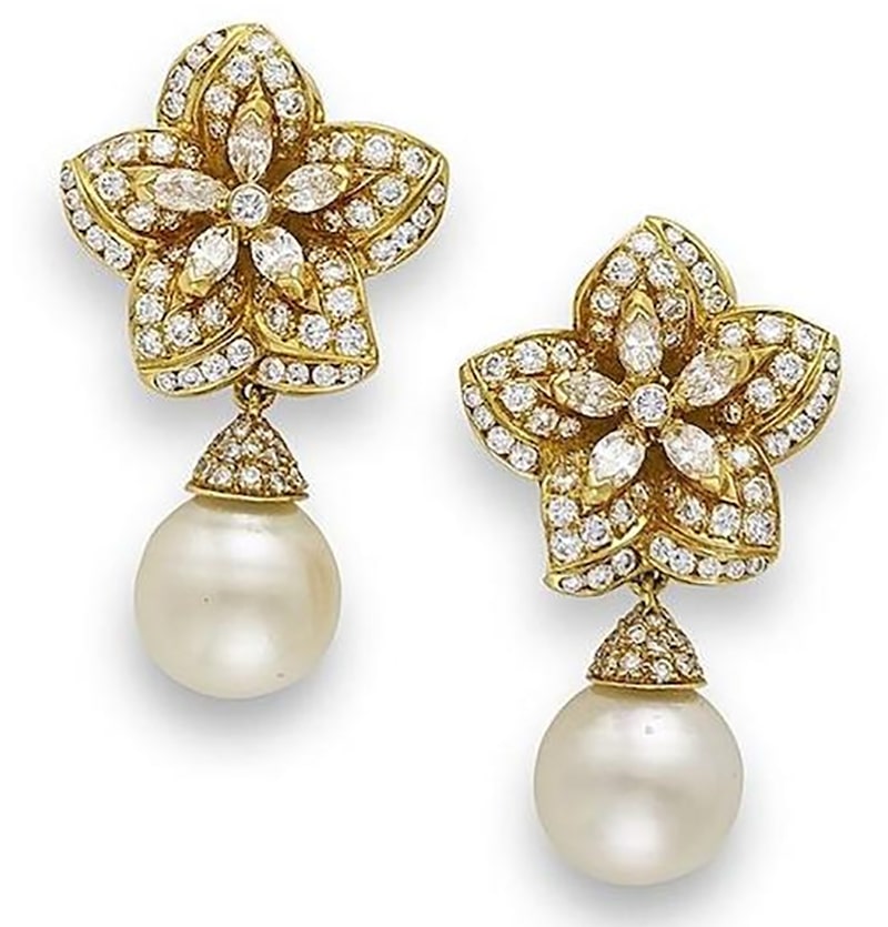 LOT 556 - A PAIR OF CULTURED PEARL AND DIAMOND EARRINGS