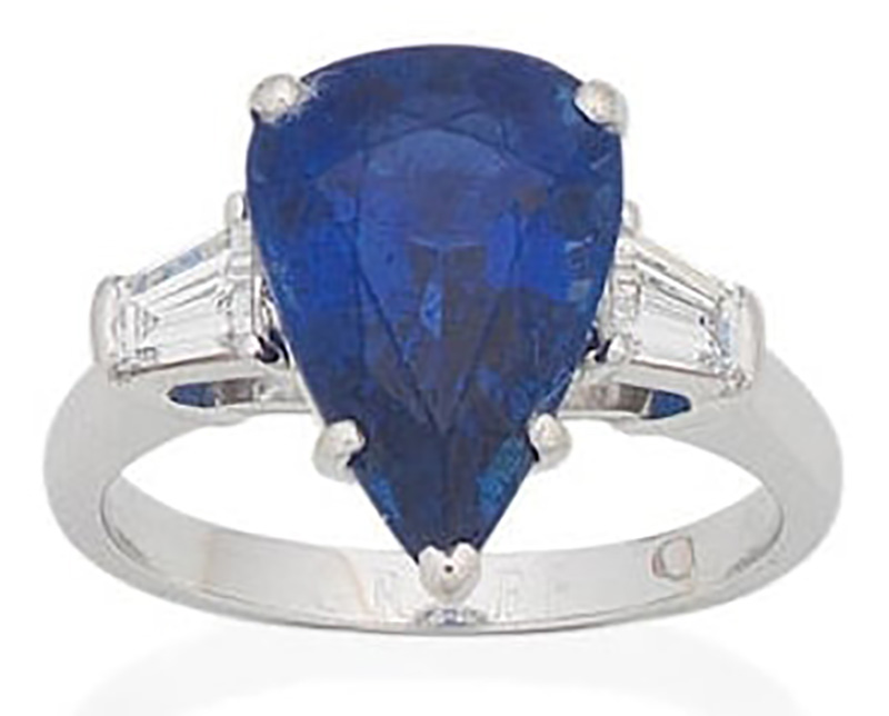 LOT 63 - A SAPPHIRE AND DIAMOND RING, by Graff
