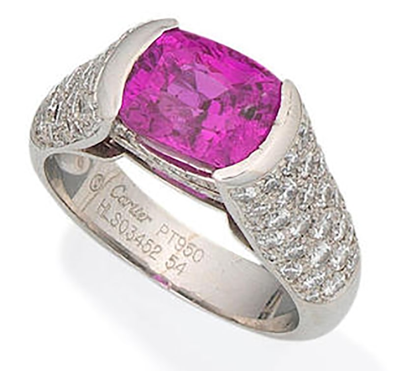 LOT 66 - A PINK SAPPHIRE AND DIAMOND RING, by Cartier 