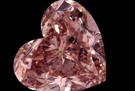 15.2 carat heart shaped fancy intense orangey pink VVS1 clarity diamond