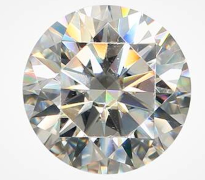 1.02 carat round brilliant cut synthetic moissanite with fradulent GIA inscription