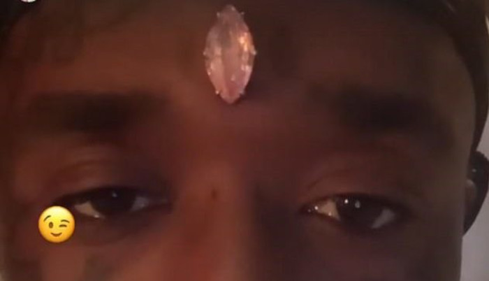 lil uzi verts pink diamond mounted on forehead