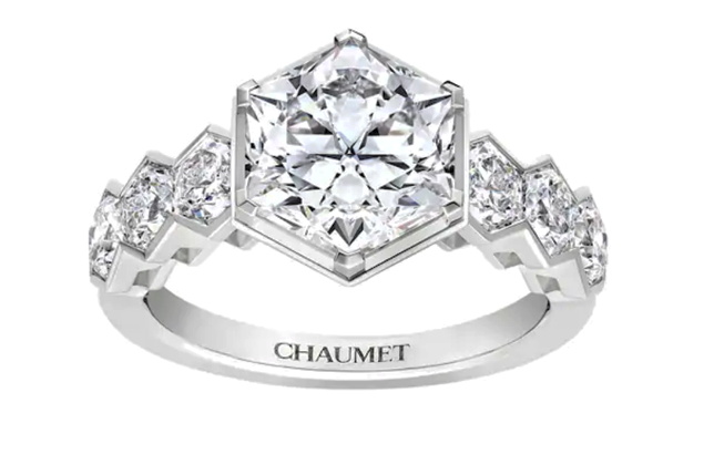 Chaumet white gold ring with central 3.00-carat taille imperatrice diamond and three 0.25-carats taille imeratrice diamonds on either side.